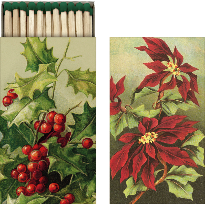 Lange Streichhölzer in einem Karton mit Weihnachtsblumen Motiv.