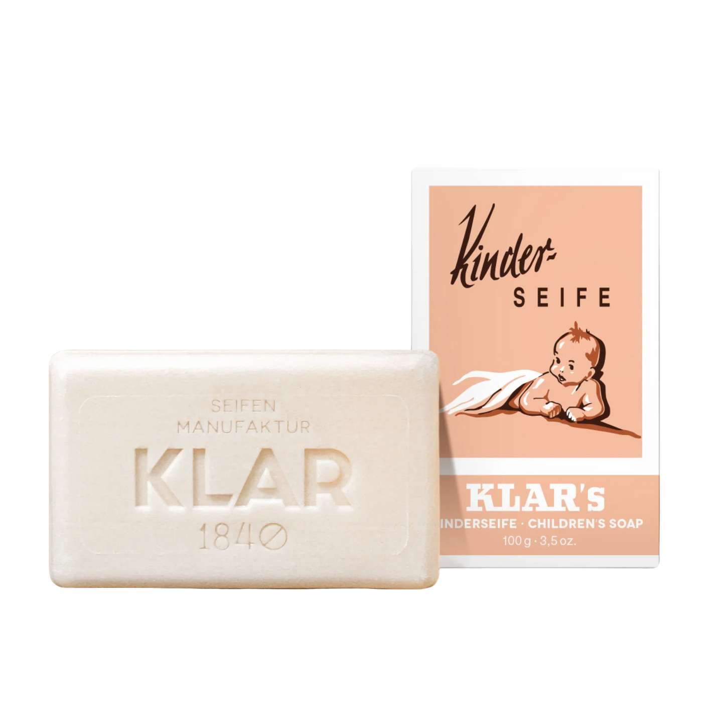 Milde Kinderseife von KLAR Seifen in einer rosa Pappschachtel mit einem Baby darauf.