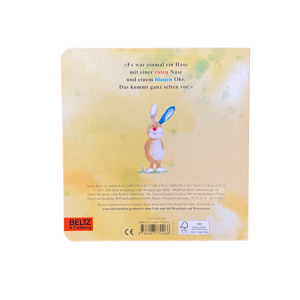 Osterbuch Rückseite mit einem Hasen und einem blauen Ohr.