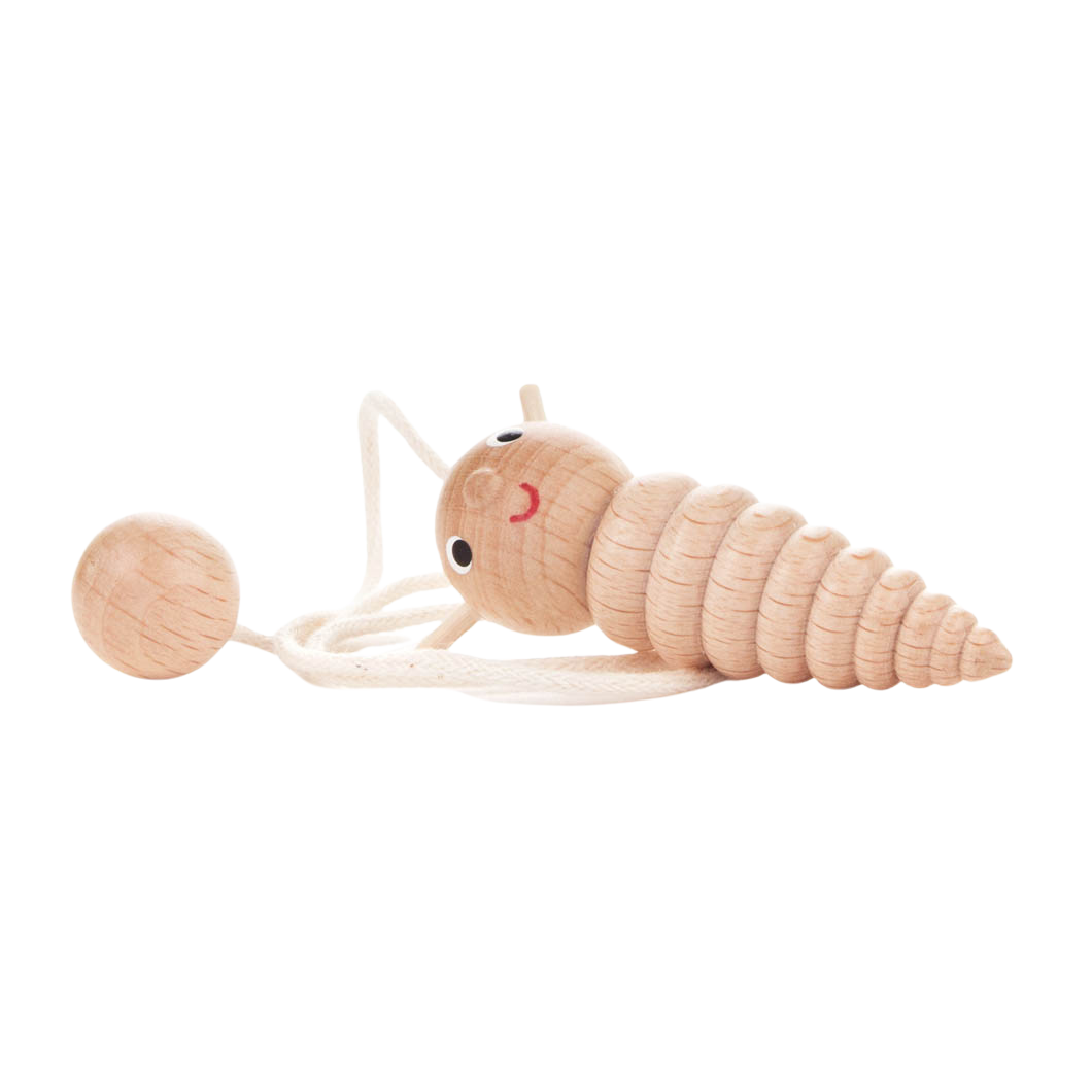 ein gedrechselter holzwurm mit einer schnur als lesezeichen