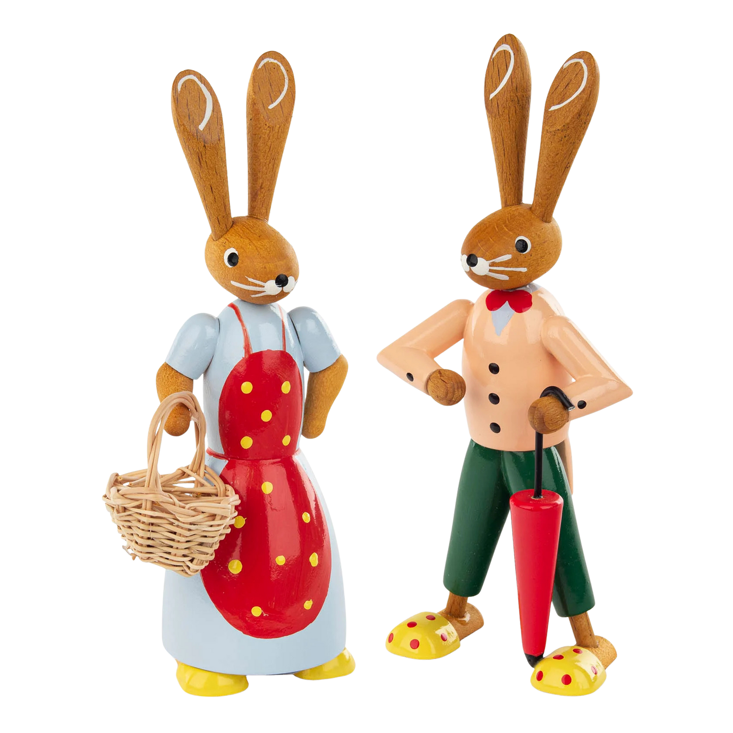 Hasenpaar aus Holz aus dem Erzgebirge. Häsin mit roter Schürze mit gelben Punkten und Korb. Hasenjunge mit grüner Hose und rotem Schirm.