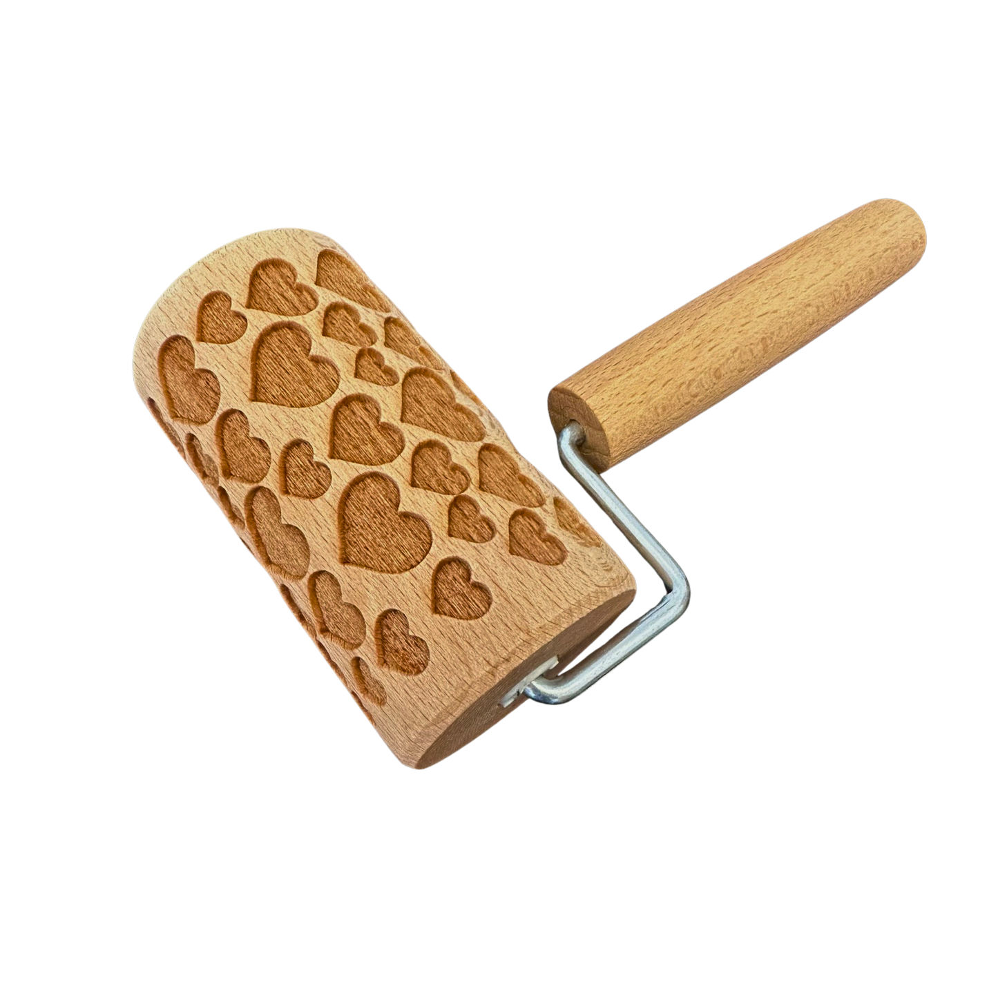 Eine Teigrolle aus Holz für eine Hand zu gebrauchen mit Herzen.
