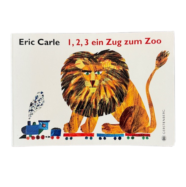 Kinderbuch Cover und ein Löwe sitz auf einer kleinen Eisenbahn.
