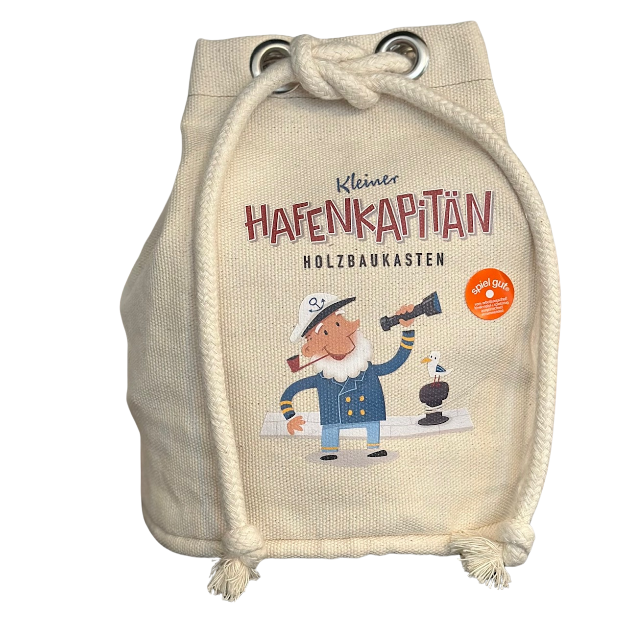 Holzbauteile in einem handgefertigten Seesack mit einem Kapitän an der Pier darauf.