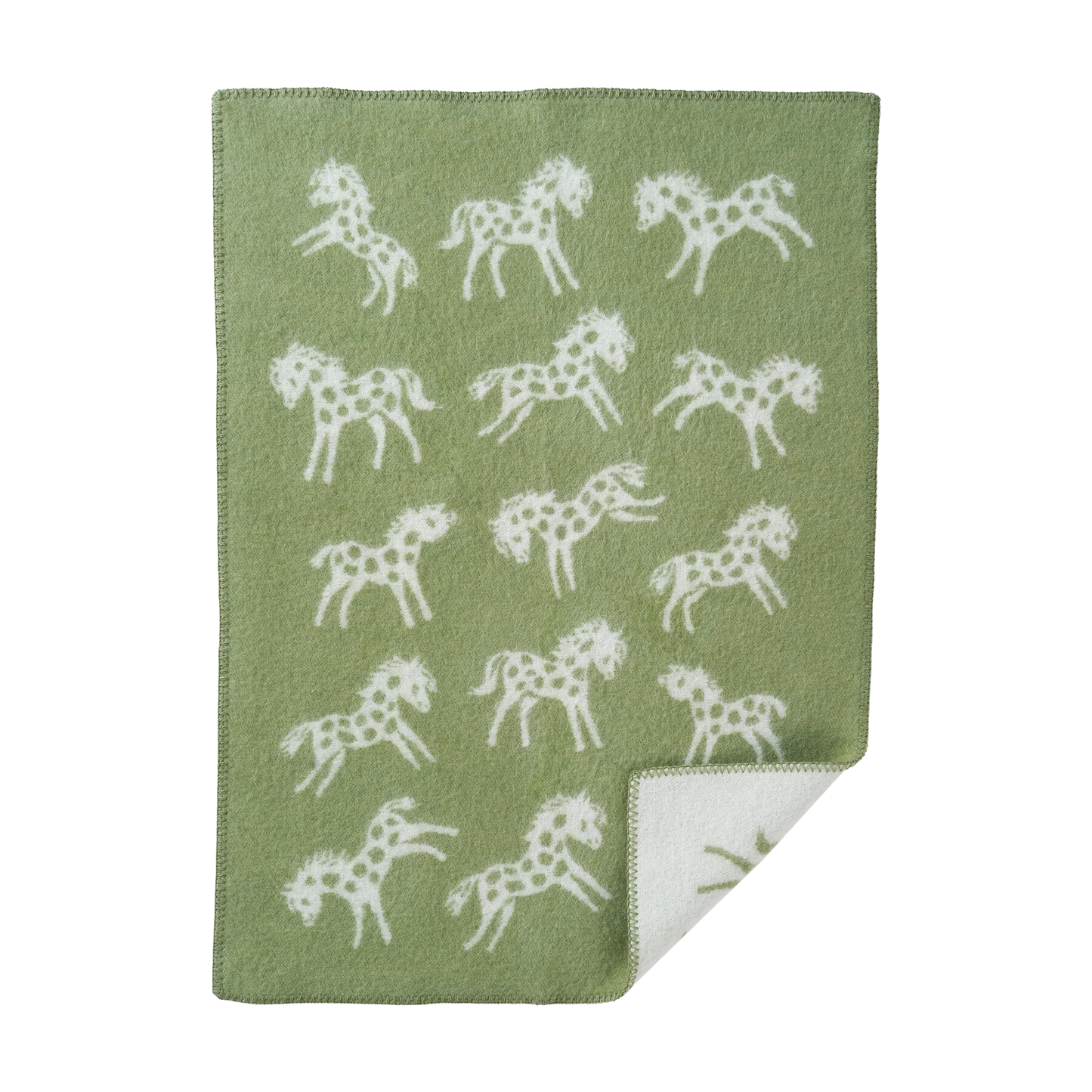 babydecke aus wolle in hellgrün mit ponys