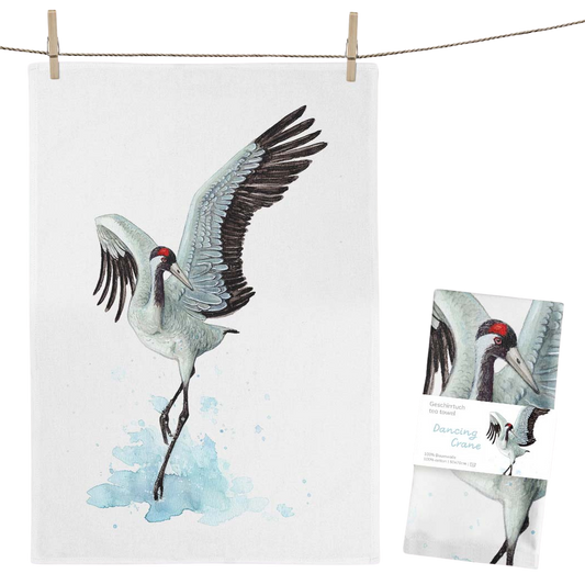 Helles Geschirrtuch aus Baumwolle mit Kranichmotiv.