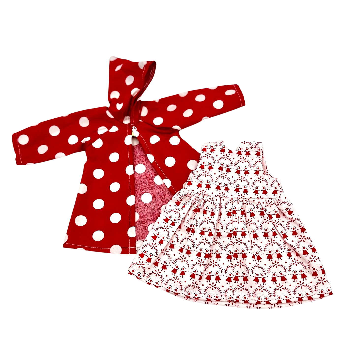 roter puppenmantel mit weißen punkten und ein weißes kleid mit kleinen roten pueppchen
