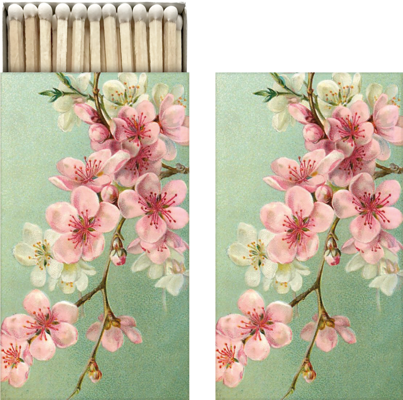 Streichholzschachtel mit Kirschblütenmotiv.