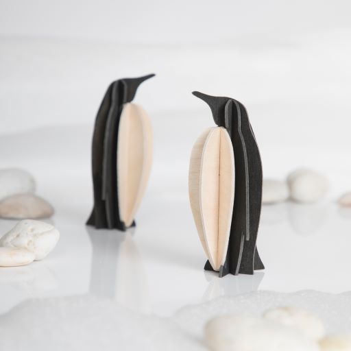 Pinguine aus Holz zum Basteln.