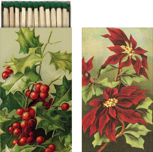 Lange Streichhölzer in einem Karton mit Weihnachtsblumen Motiv.