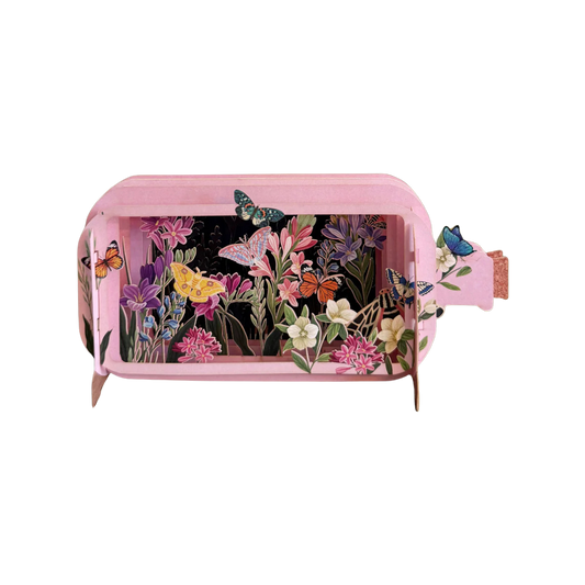 Pop-up Grußkarte mit einer Blumenwiese mit Schmetterlingen. In Flaschenform und zum Beschriften.