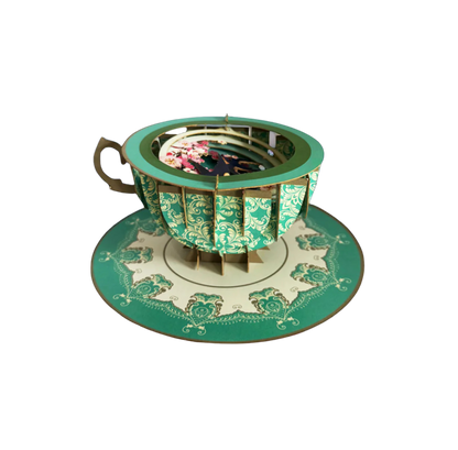 Faltbare Pop-up Grußkarte als Teetasse mit Kirschblüten in der Tasse.