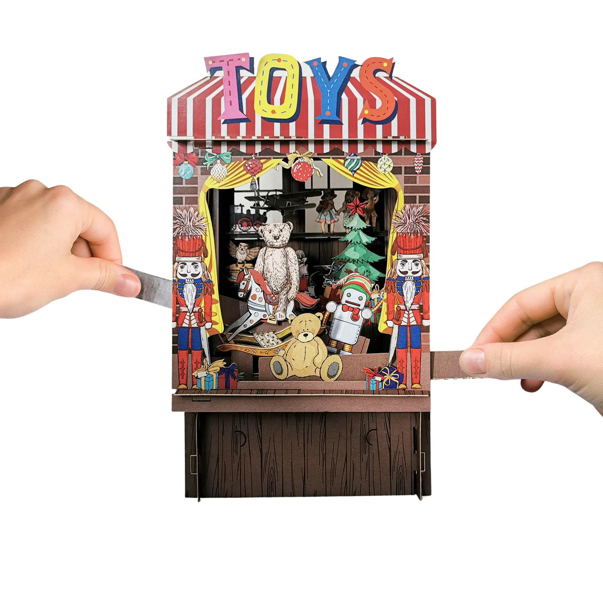 Pop-up Grußkarte als Miniaturtheater. Ein Weihnachtsabend mit Tannenbaum und vielen Geschenken.