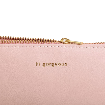 Rosa Kosmetiktasche aus Leder mit Aufschrift wunderschön.