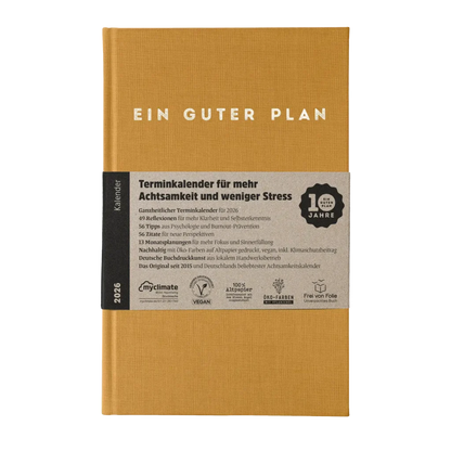 Ein bernsteinfarbener Kalender 2026.