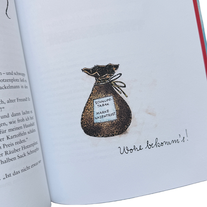 Ein kleiner brauner Sack mit der Aufschrift Schnupftabak, Marke Nasentrost.