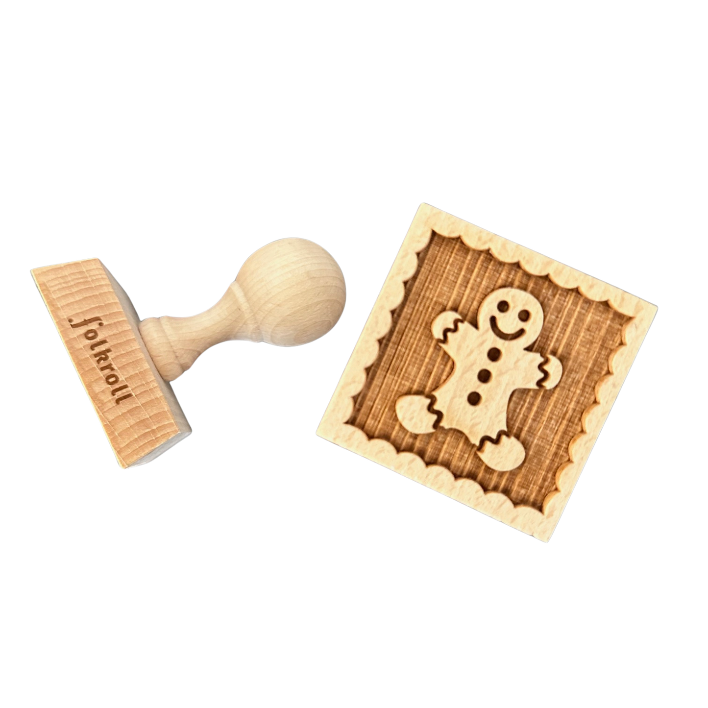 Ein Keksstempel aus Holz mit Lebkuchenmann Motiv.