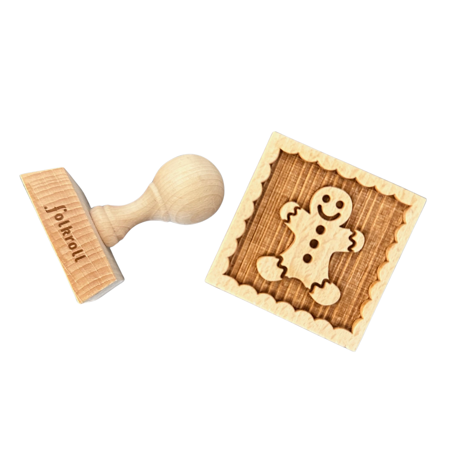 Ein Keksstempel aus Holz mit Lebkuchenmann Motiv.