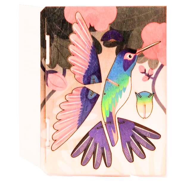 Schablone mit Kolibri Stanzfiguren und ein Umschlag.