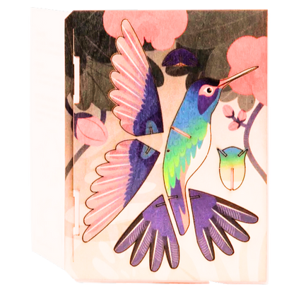 Schablone mit Kolibri Stanzfiguren und ein Umschlag.
