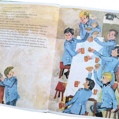 Kinderbuch - Bei der Feuerwehr wird der Kaffee kalt. Buchseite mit der Feuerwehrmannschaft beim Frühstück.