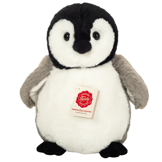 Pinguin Kuscheltier in Weiss mit schwarzem Kopf und schwarzen Füssen.
