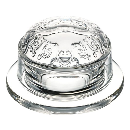 Butterdose aus Glas. Zweiteilig, rund und mit Blumenmotiv auf dem Glasdeckel. 