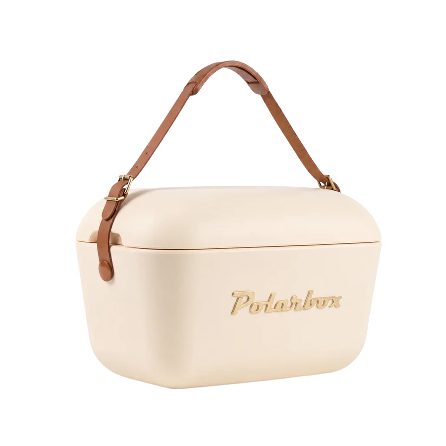 Kühltasche in Creme und braunem Ledergurt. Vintage Style und goldener Aufschrift Polarbox.