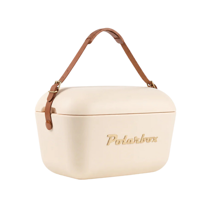 Kühltasche in Creme und braunem Ledergurt. Vintage Style und goldener Aufschrift Polarbox.