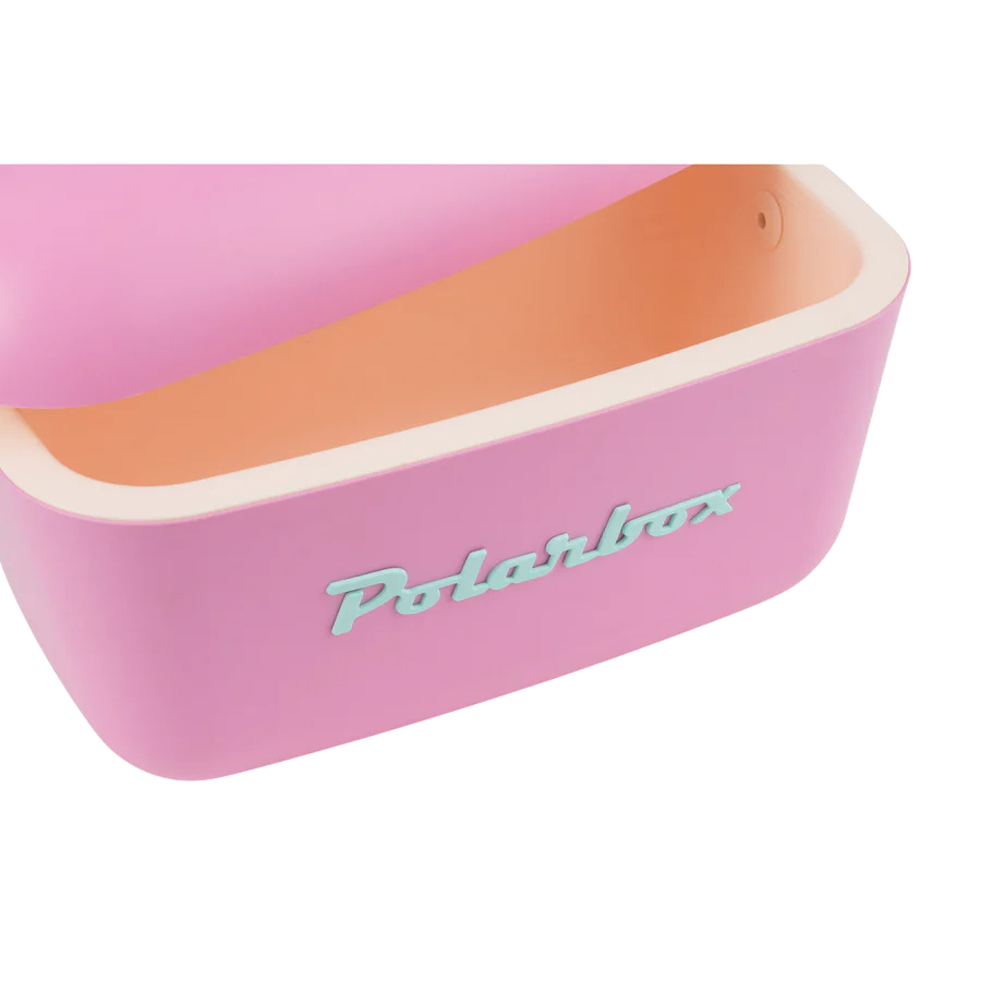 Kühltasche in Pink und hellblauen Ledergurt. Vintage Style und hellblauer Aufschrift Polarbox.