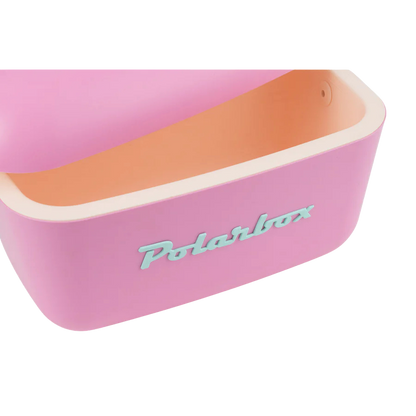 Kühltasche in Pink und hellblauen Ledergurt. Vintage Style und hellblauer Aufschrift Polarbox.
