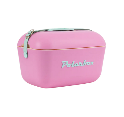 Kühltasche in Pink und hellblauen Ledergurt. Vintage Style und hellblauer Aufschrift Polarbox.