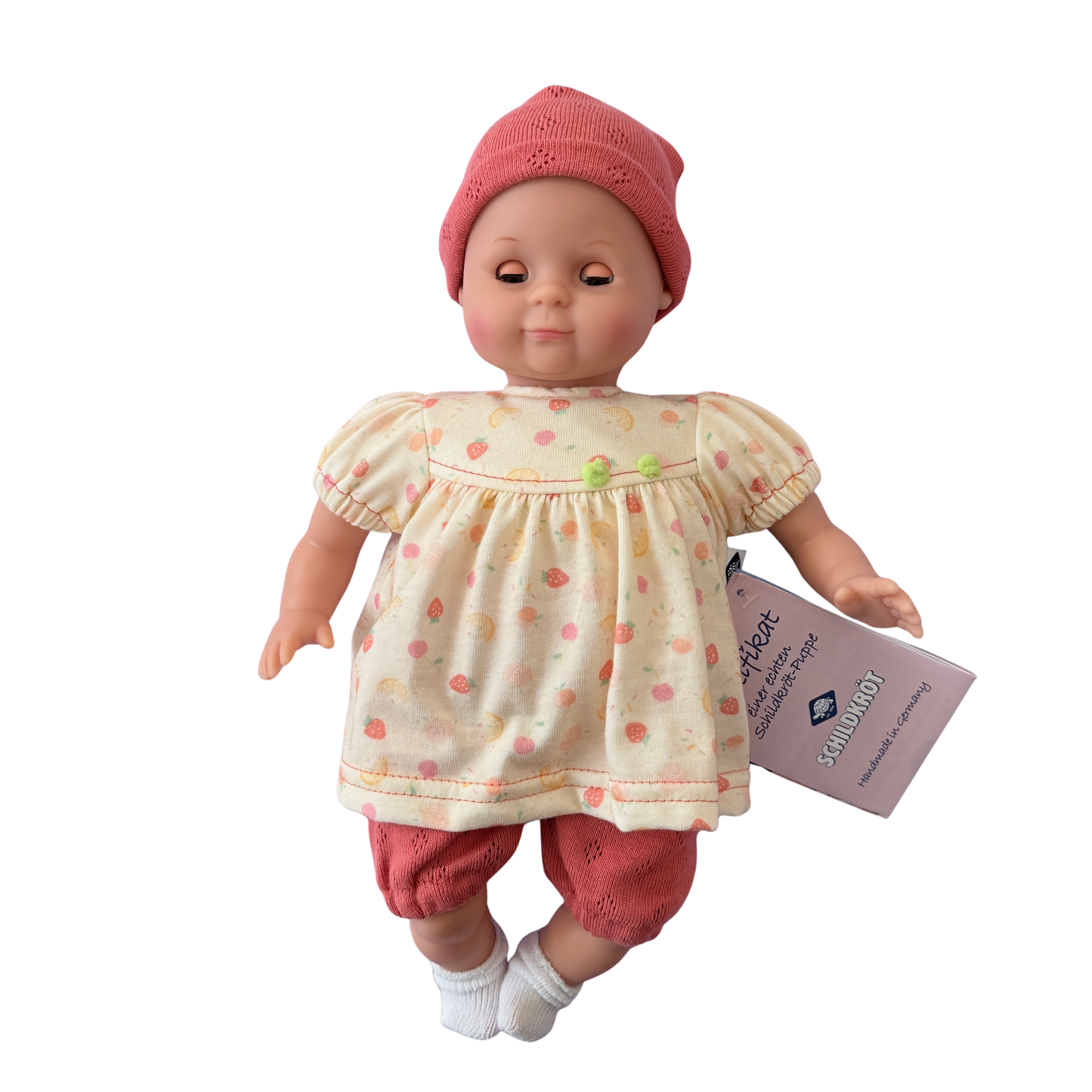 puppe von schildkroet aus thueringen mit bunten kleid und muetze und socken bei nordic-soul