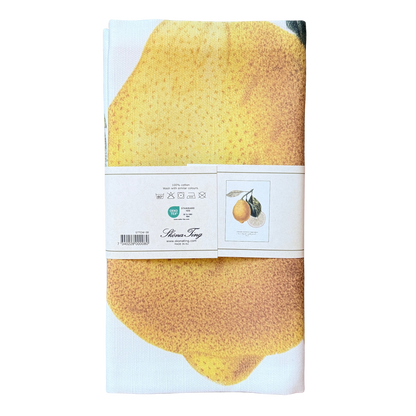 Geschirrtuch aus  Baumwolle mit Zitronenmotiv darauf. 