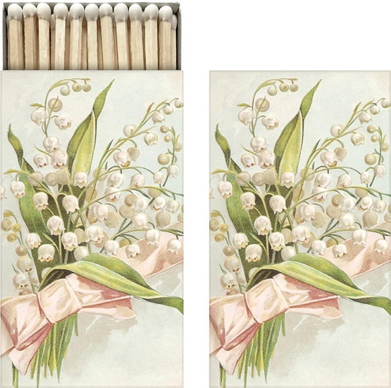 Lange Streichhölzer in einer Schachtel aus Karton mit Maiglöckchen im Vintage Style. 