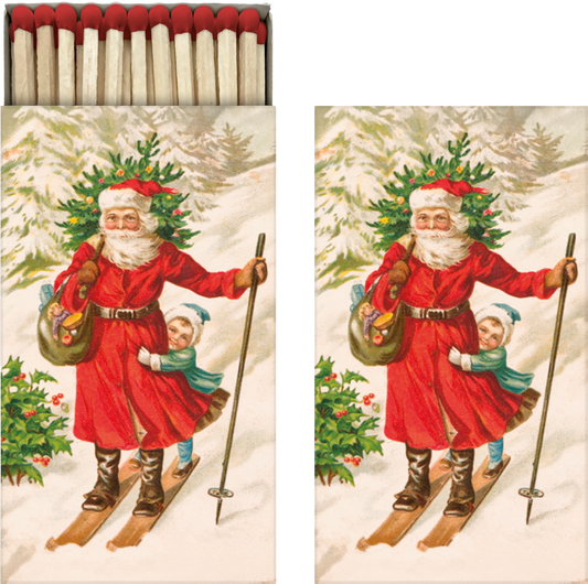 Lange Streichhölzer in einem Karton mit Weihnachtsmann Motiv.