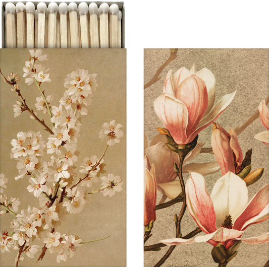 Streichholzschachtel mit Magnolienmotiv. 