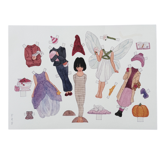 Bastelbogen Anziehpuppe mit schwarzen Haaren aus Karton mit verschiedenen Kleidungsstücken. 