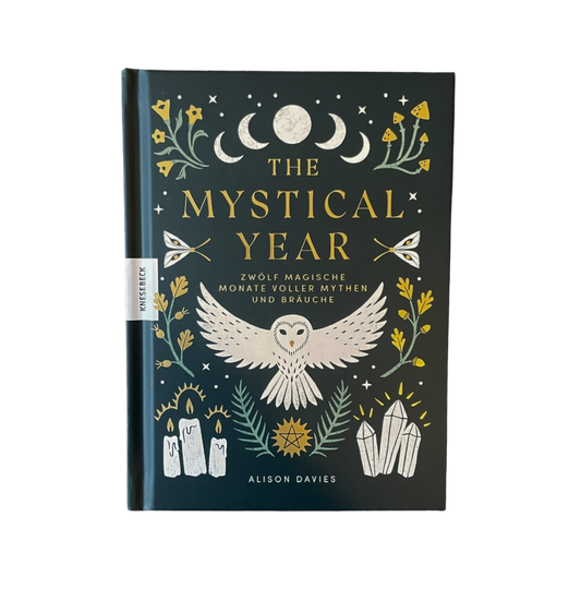 Ein Buch mit einer Eule, Kräutern und einem abnehmenden und zunehmenden Mond darauf. Ein mystischer Jahresbegleiter. 