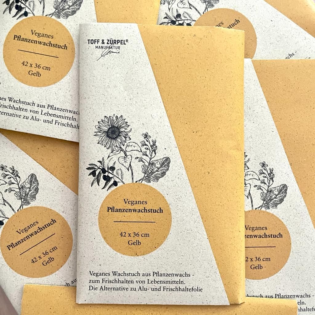 Verpackte gelbe vegane Wachstücher.