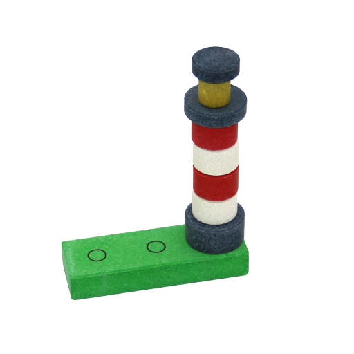 ein leuchtturm aus gestapelten bausteinen aus stein als knobelspiel 